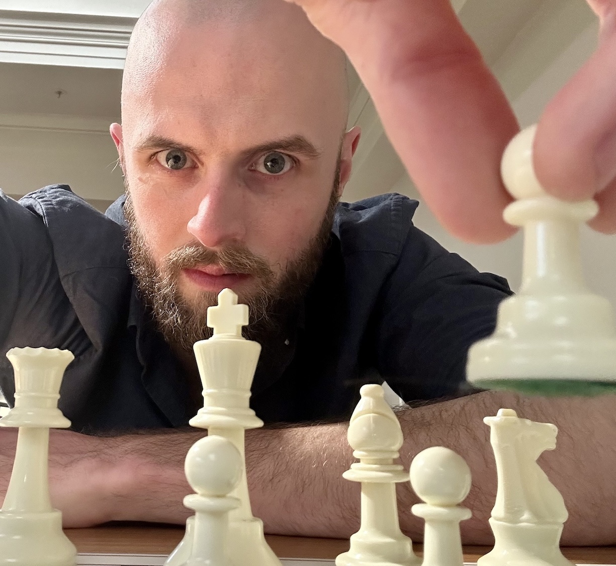 headshot of Aiden playing Chess looking perhaps a little overly serious